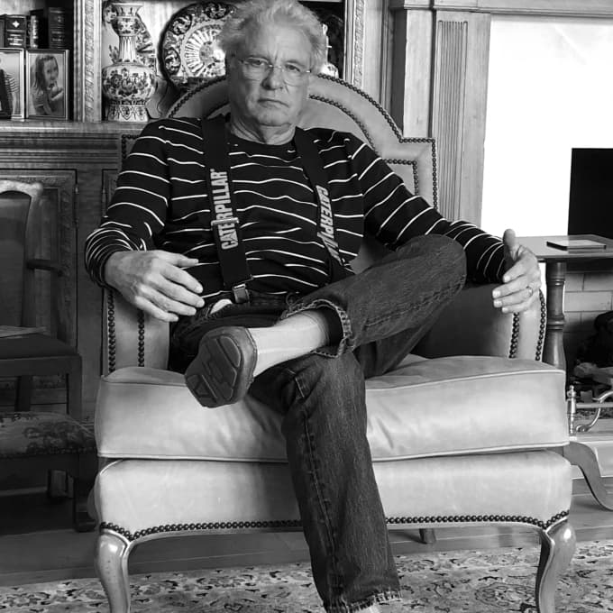 James Biesecker seated